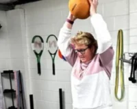 Happy woman in exercise class